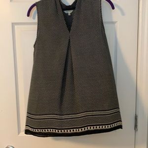 Sleeveless black dress top